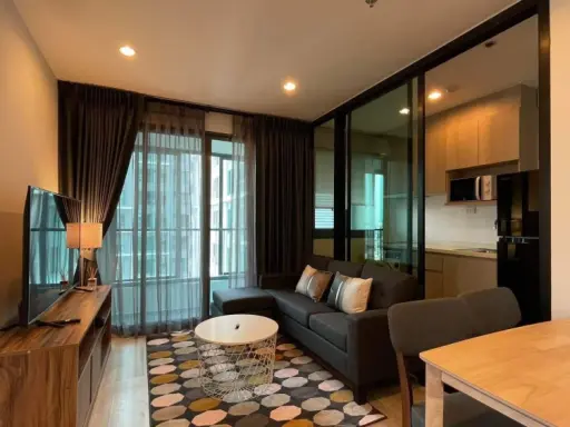 For rent: Ideo Mobi Charan-Interchange, 17th floor, north-facing, ready to move in. The unit has a partition separating the kitchen and living area.