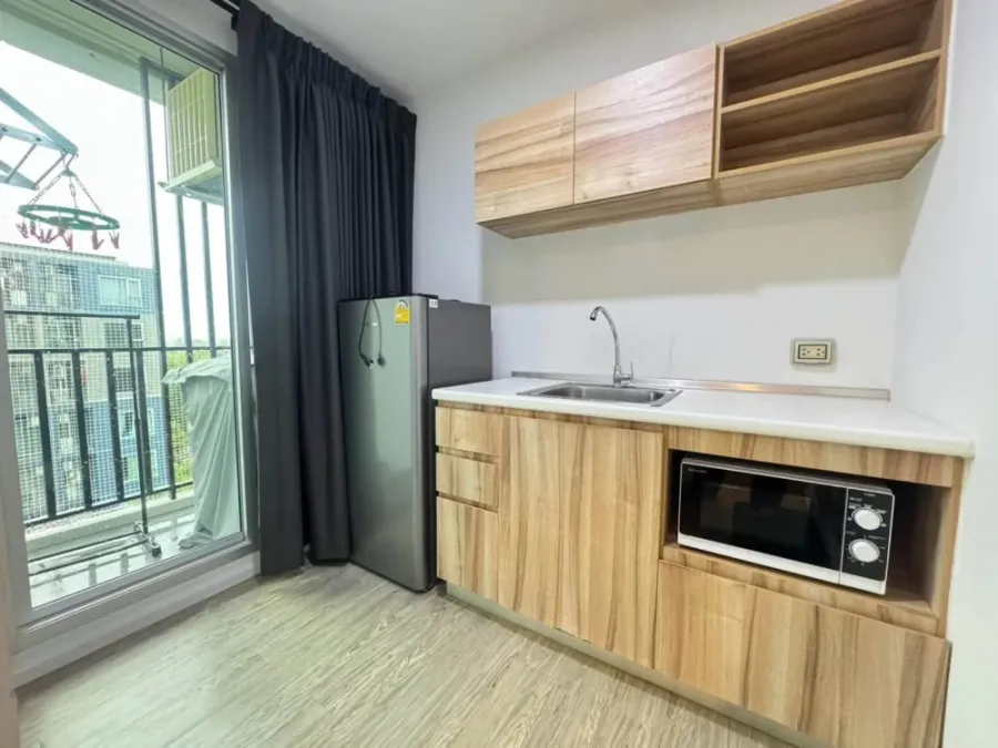For rent: Happy Condo DonMueang The Terminal, 7th floor, with communal pool view, fully furnished and ready to move in.