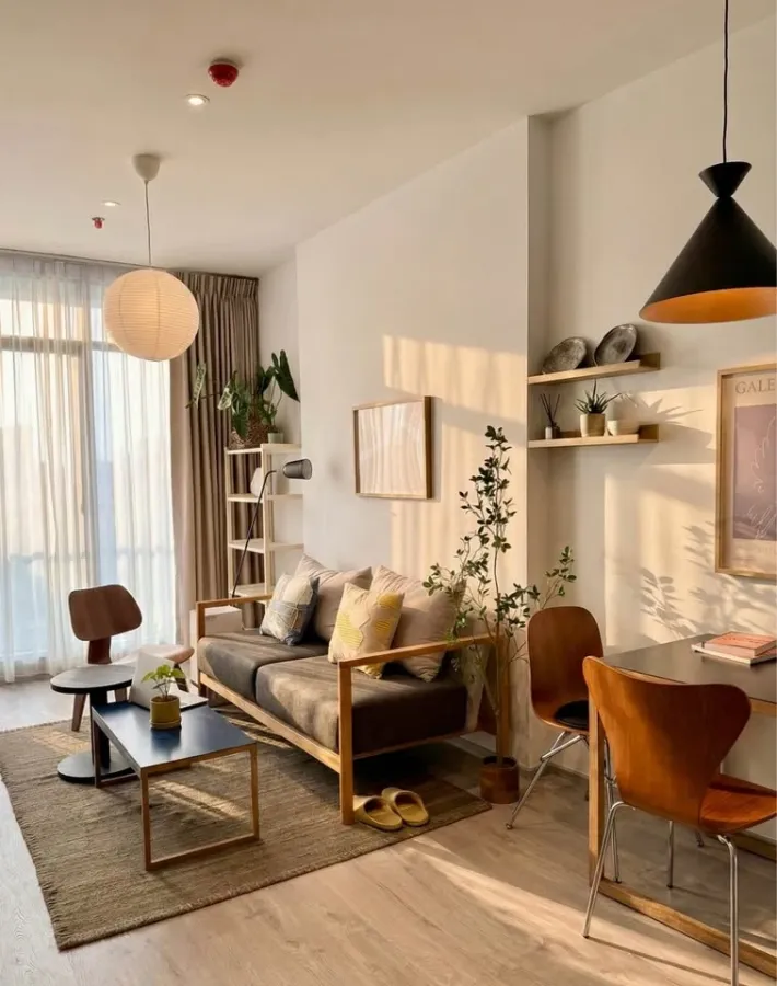For rent: Rhythm Ekkamai Estate, decorated in a Cozy Modern concept with warm tones, offering a comfortable and spacious living area with plenty of na