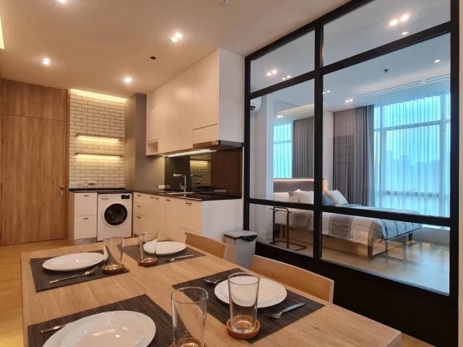 For rent: Sathorn - Chao Phraya house, corner unit with stunning Chao Phraya river bend view, fully furnished with built-in features. Don't miss out!