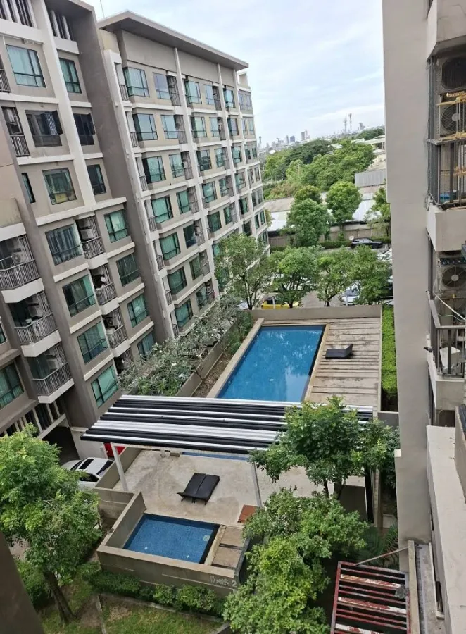 For rent: Premio Prime, Building C, 6th floor, corner room, view of houses and nearby buildings, and Kaset Nawamin Road. Reserve now!
