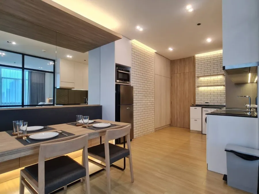 For rent: Sathorn - Chao Phraya house, corner unit with stunning Chao Phraya river bend view, fully furnished with built-in features. Don't miss out!