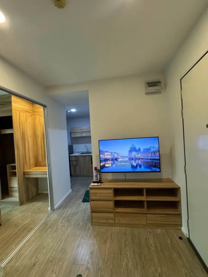 For rent: Happy Condo DonMueang The Terminal, 7th floor, with communal pool view, fully furnished and ready to move in.