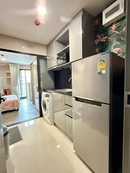 For rent: Galileo Ratchada 32, a lovely room with beautiful wallpaper. Don't miss out on this great deal.