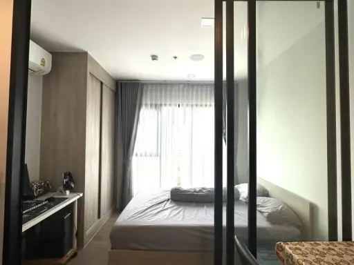 For rent: Modiz Sukhumvit 50 condo. The unit is partitioned into separate, well-defined zones. Great price! Book now, don't miss out!