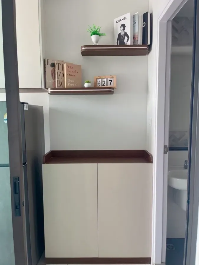 For rent: Regent Home Watthakat. The room features built-in furniture, a glass partition, and appliances. Book now!