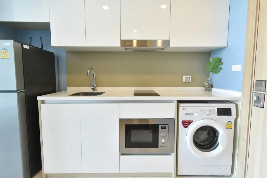 Selling a studio unit at The Riviera Wongamat Beach. High-quality wallpaper and beautiful interior. Book now!