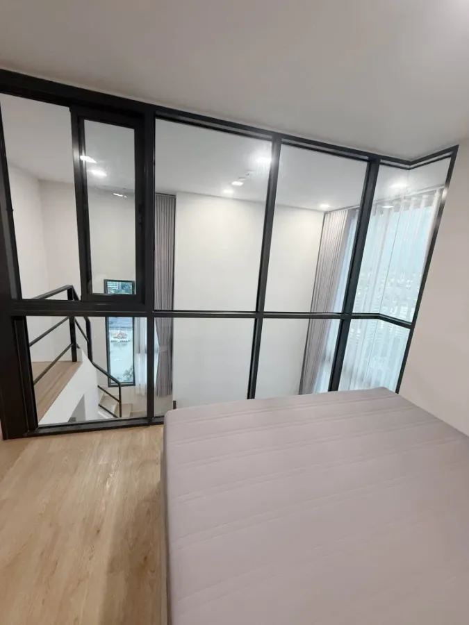 Modiz Rhyme Ramkhamhaeng Duplex, 2-story corner unit, 28th floor, beautiful city view. Book now! Don't wait!