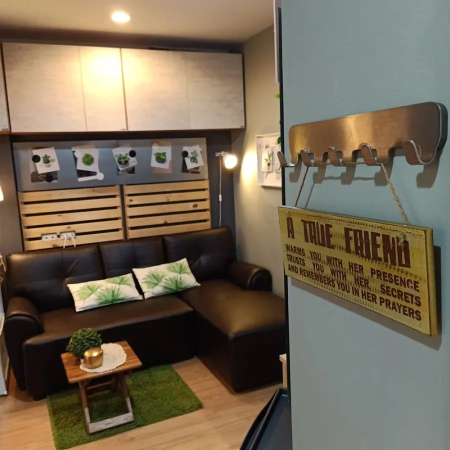 For rent: Lumpini Ville On Nut 46, has a living room in a Wood Industrial style, lots of built-in cabinets for storing things, urgent.
