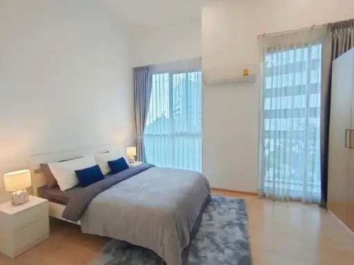 Condo for sale or rent: Noble Revolve Ratchada 2. The living room balcony is very wide next to the swimming pool. images