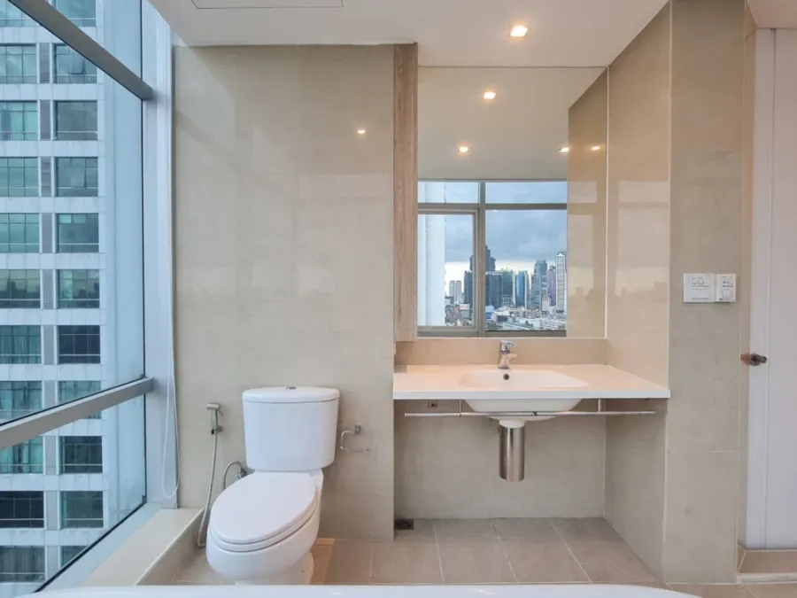 For rent: Sathorn - Chao Phraya house, corner unit with stunning Chao Phraya river bend view, fully furnished with built-in features. Don't miss out!