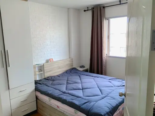 For rent: Lumpini Condo Town Rattanathibet, 1 bedroom, 1 bathroom, wallpapered throughout the room. Book now before you miss out.