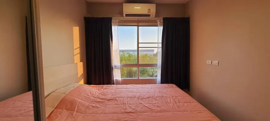 For rent: Plum Condo Rangsit Alive Phase 1, near Bangkok University, 4th floor, Building D. Fully furnished with appliances, ready to move in.