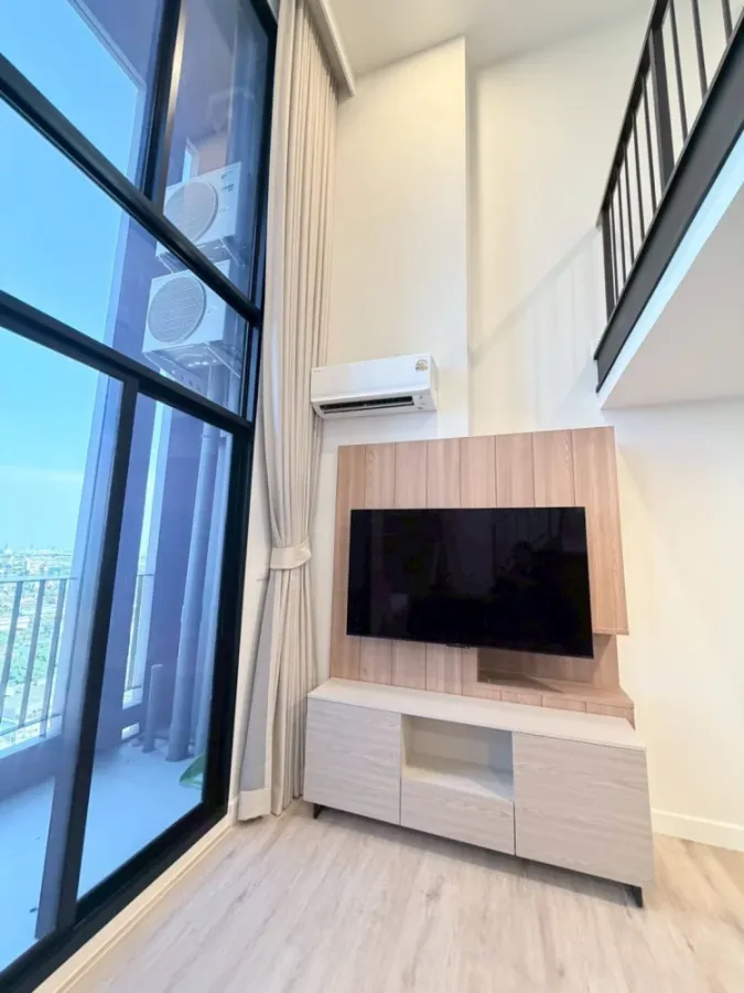 For rent: XIM Suksawat - Rama 3. Spacious room with high ceilings, airy feel, high-quality built-in furniture, and beautiful view. Book now!