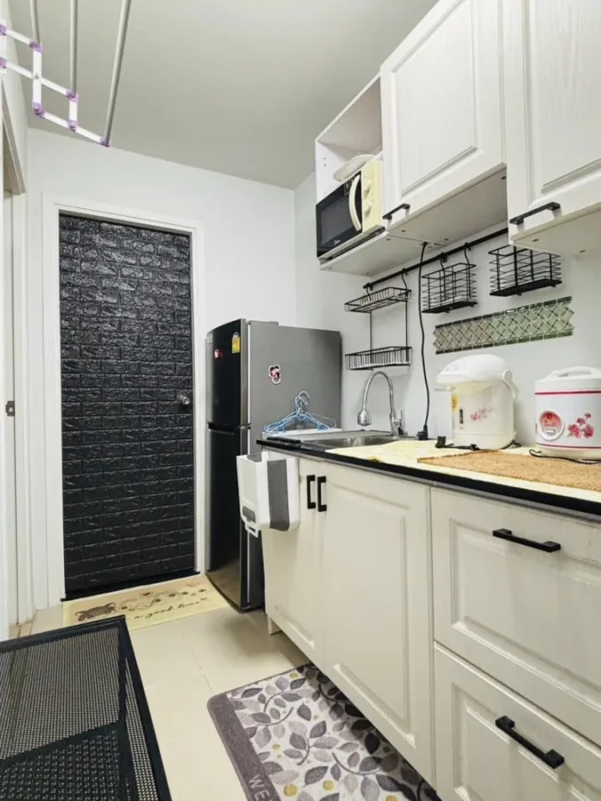 Plum Condo Paholyothin 89 for rent, a nice room with complete amenities, a comfortable brown sofa. Don't miss it!
