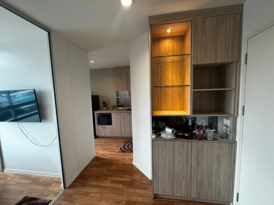 For rent: Lumpini Park Phetkasem 98, 9th floor unit. Fully furnished with built-in furniture, pool view, great ventilation. Don't miss out!