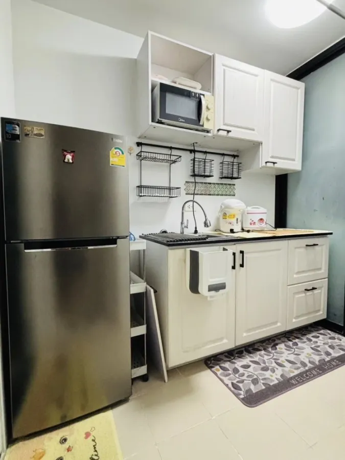 Plum Condo Paholyothin 89 for rent, a nice room with complete amenities, a comfortable brown sofa. Don't miss it!