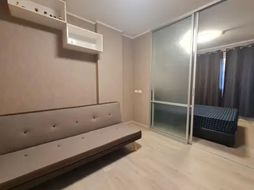 For rent: Lumpini Condo Town Bang Khae, airy and comfortable room, with gray wallpaper throughout the room. Interested? Book now!