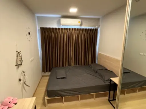 For sale: Plum Condo Rangsit Alive Phase 1, 2nd floor, Building A, free furniture and appliances in the entire room. Book now.