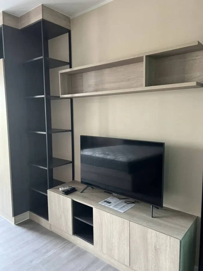 For sale/rent: D Condo Hideaway Rangsit Phase 4. There is a glass door separating the bedroom and kitchen. Very attractive.