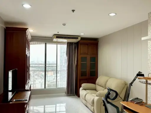Condo for rent at Pathumwan Resort, 21st floor. Beautiful, spacious, and airy view. Two balconies for natural light and breeze. Book now!