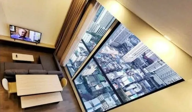 For rent: Duplex unit at Park Origin Ratchathewi. High ceilings, spacious and comfortable. High floor with stunning city views and floor-to-ceiling wi