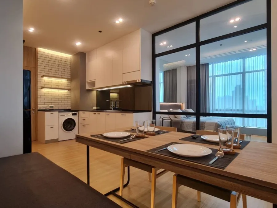For rent: Sathorn - Chao Phraya house, corner unit with stunning Chao Phraya river bend view, fully furnished with built-in features. Don't miss out!