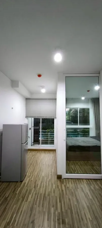 For rent: The Iris Bangya. Beautiful, clean room with complete furniture and appliances. Ready to move in immediately.