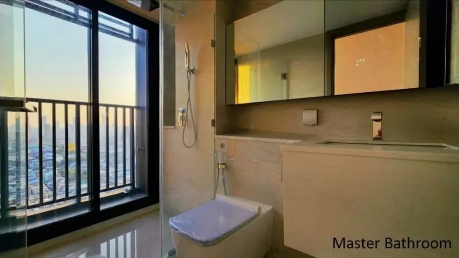 For rent: Duplex unit at Park Origin Ratchathewi. High ceilings, spacious and comfortable. High floor with stunning city views and floor-to-ceiling wi