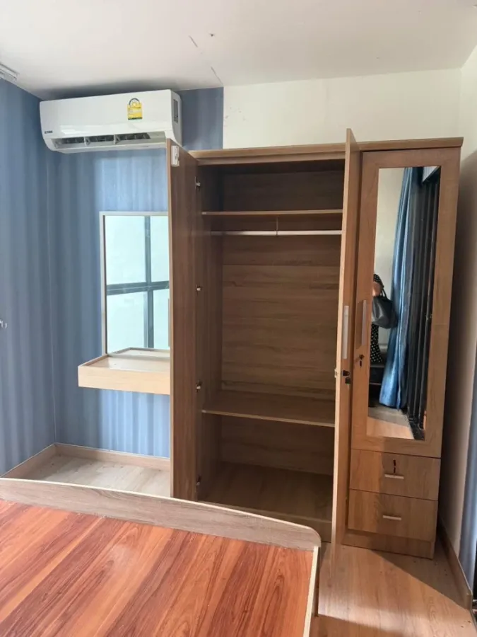 For rent: The Excel Khu Khot, Building C, 2nd floor. Includes washing machine, wallpaper throughout, and high-quality double-layered curtains. Book no