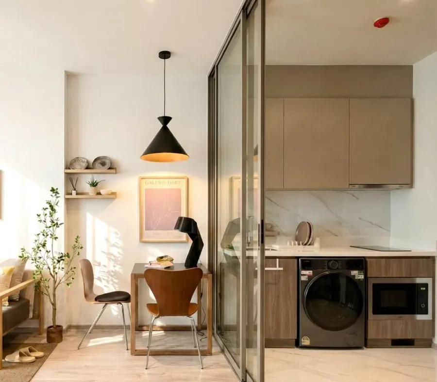 For rent: Rhythm Ekkamai Estate, decorated in a Cozy Modern concept with warm tones, offering a comfortable and spacious living area with plenty of na