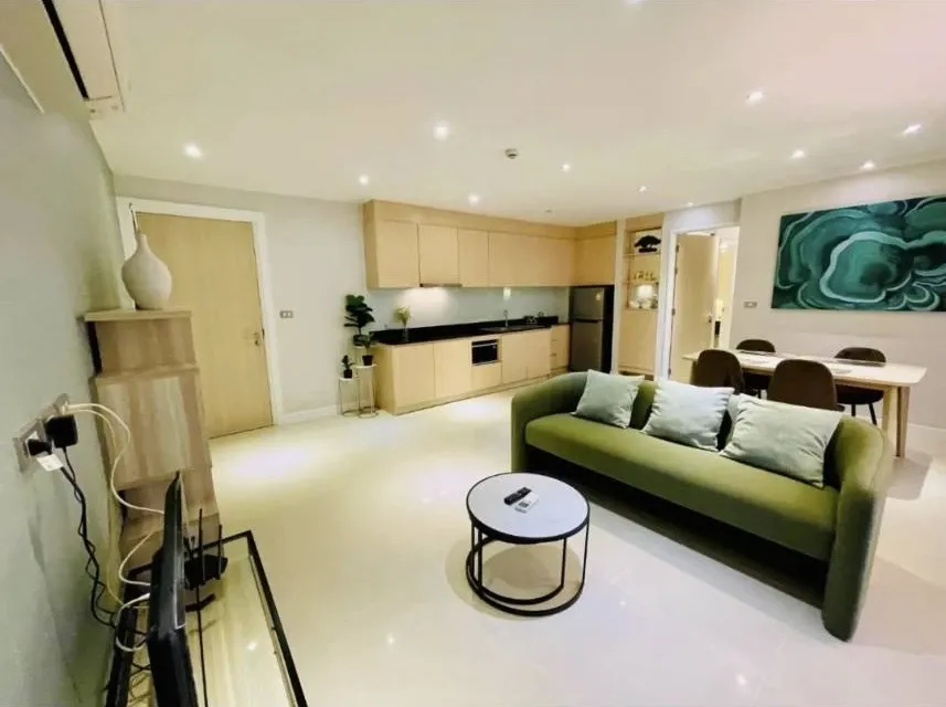For rent: Grand Caribbean Resort Pattaya, 2 bedrooms, 2 bathrooms, 1st floor, back of the room, open to walk directly into the water park pool. If you