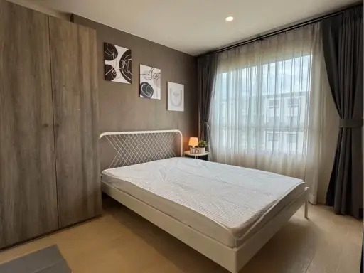 For rent: Lumpini Ville Phra Nang Klao Riverview, a nice room with a swimming pool view + shady garden, fully equipped with amenities. Book now before