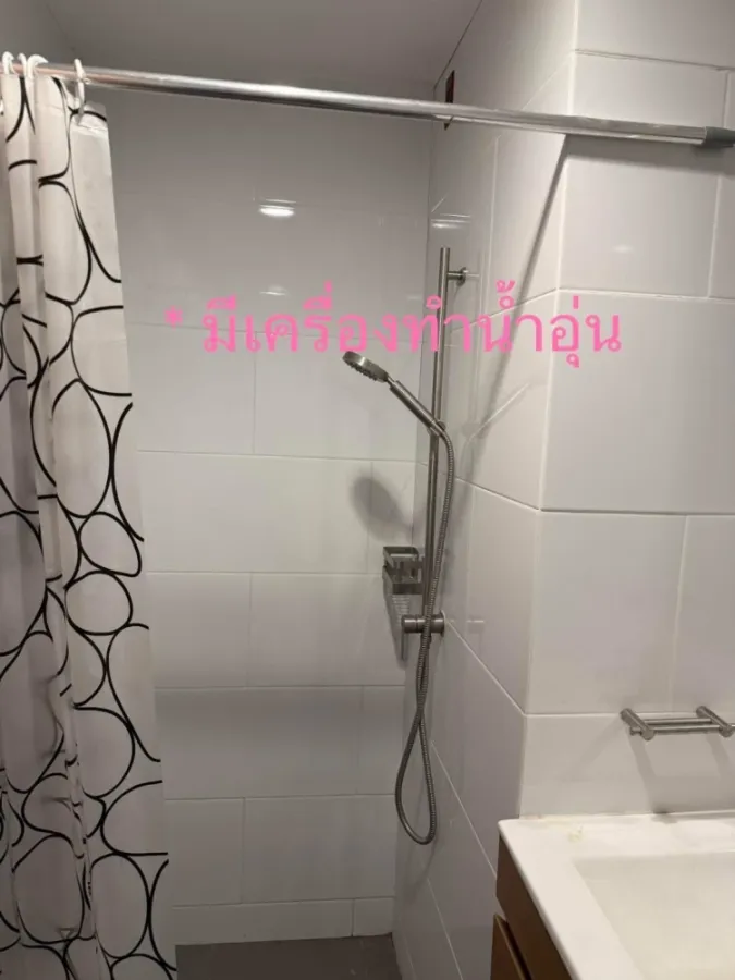 For rent: The Excel Khu Khot, Building C, 2nd floor. Includes washing machine, wallpaper throughout, and high-quality double-layered curtains. Book no