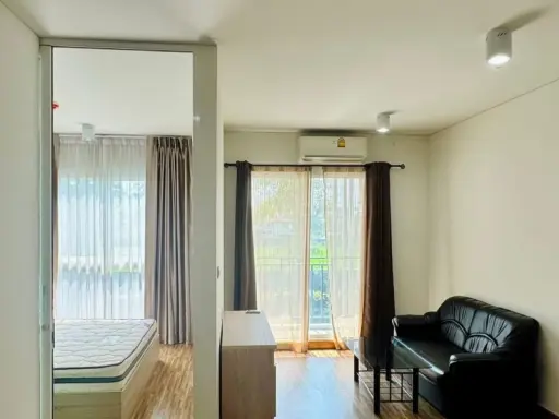 For rent at The IRIS Bangya. We provide all the essential furniture. Only one wall is shared with a neighbor; the other side is open, making it very q