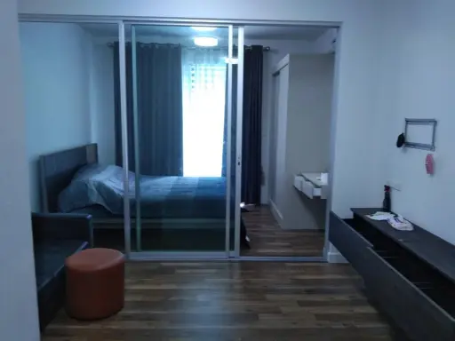 Condo for sale, A Space Me, Sukhumvit 77, 2nd floor, not very high, separated by glass partition, has a view of the pool. Don't wait, book now.
