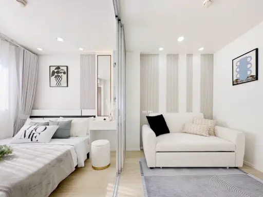 Selling Lumpini Condo Town Ramindra-Lat Pla Khao, 2nd floor unit. Beautifully decorated with a consistent color scheme and fully furnished. Book now! images