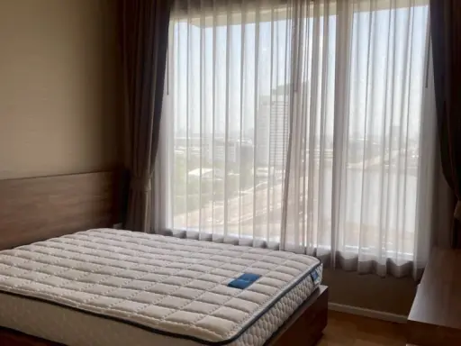 For rent: The Saint Residences, corner room, balcony facing the main road, view of the BTS. Book now and you won't be disappointed.