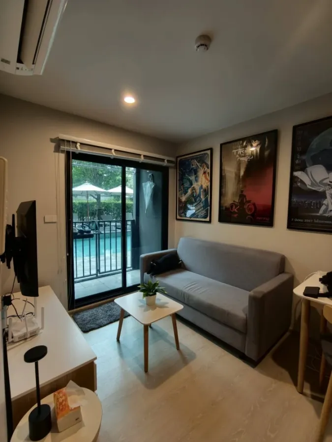 Selling Nue Connex Condo Donmuang, Building E, 1st floor, poolside. Ready to move in, fully furnished with appliances.