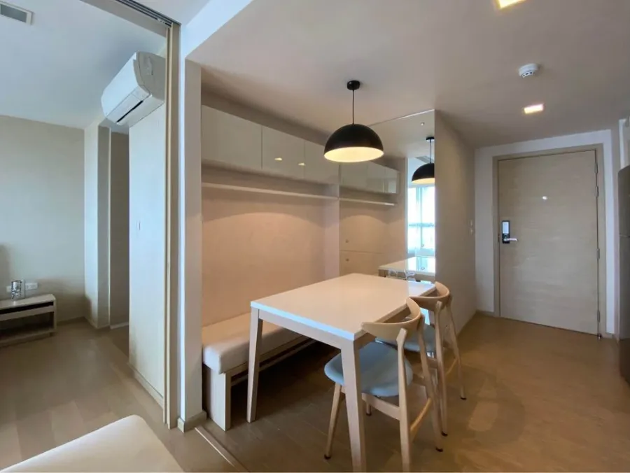 Condo LIV@49 for rent, white-toned room, clean and comfortable to the eyes, very spacious room, large-screen TV, can watch movies to your heart's cont