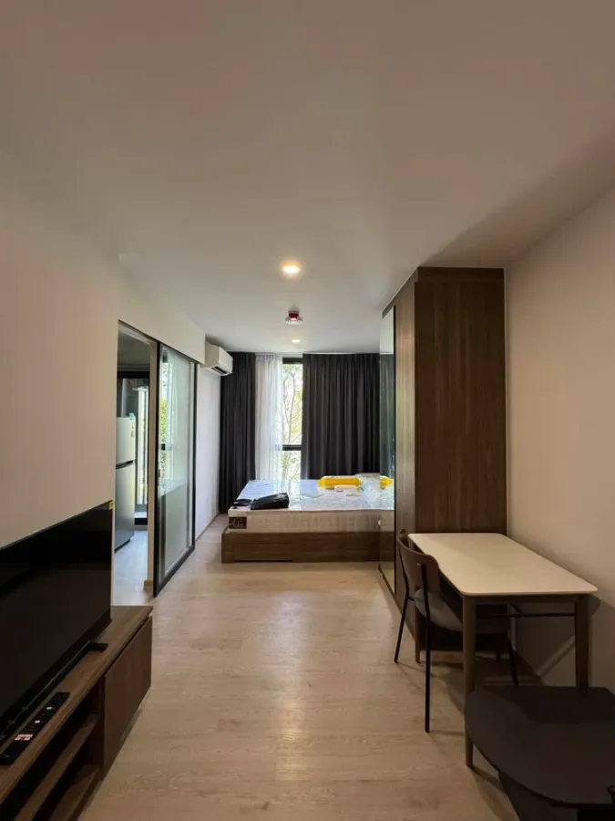 For rent: Nue Core Khu Khot Station, studio room, 2nd floor, fully furnished, includes washing machine. Don't miss out!
