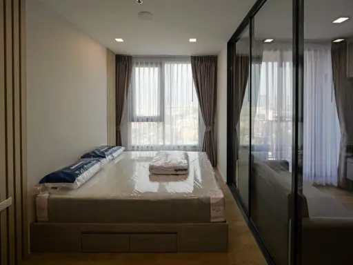 For rent: Modiz Rhyme Ramkhamhaeng. Beautiful room with a warm, homey atmosphere. The room features built-in furniture for practicality and a unique d