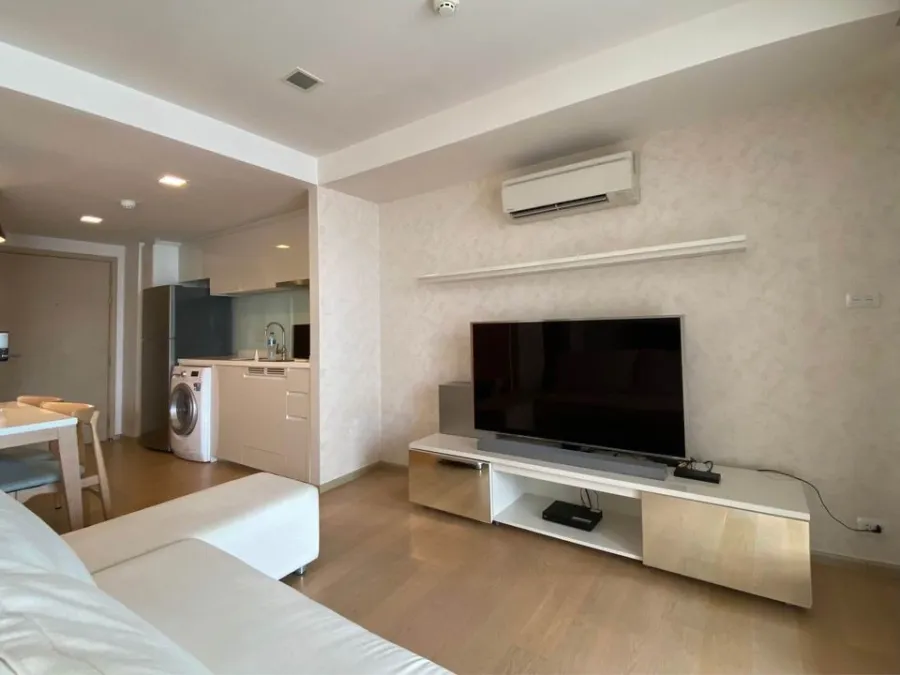 Condo LIV@49 for rent, white-toned room, clean and comfortable to the eyes, very spacious room, large-screen TV, can watch movies to your heart's cont
