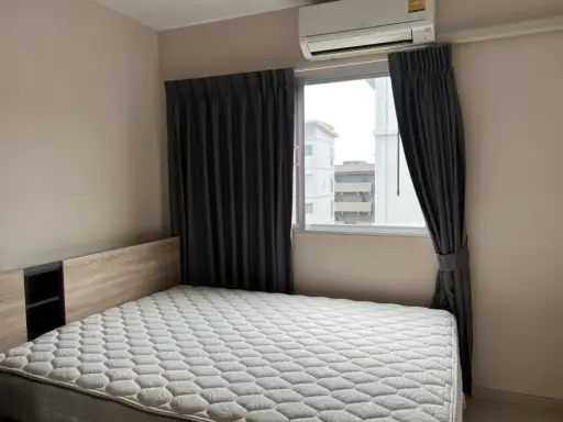 For sale: Plum Condo Park Rangsit Phase 1-3. The room is separated into sections. Fully furnished with separate kitchen. Book now. images