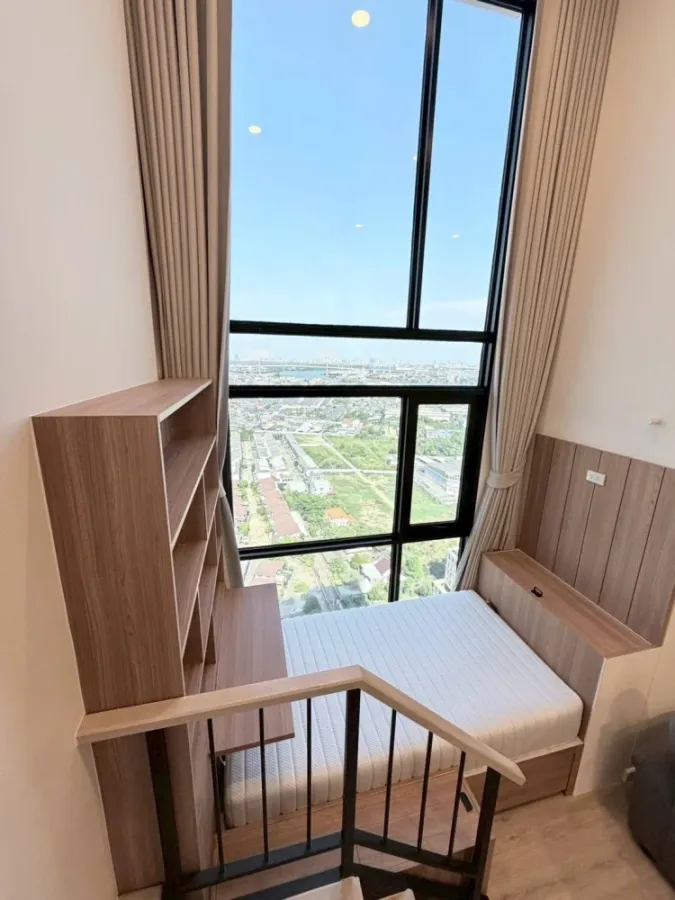 For rent: XIM Suksawat - Rama 3. Spacious room with high ceilings, airy feel, high-quality built-in furniture, and beautiful view. Book now!