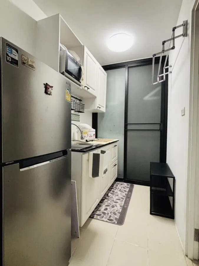 Plum Condo Paholyothin 89 for rent, a nice room with complete amenities, a comfortable brown sofa. Don't miss it!