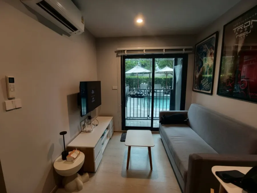 Selling Nue Connex Condo Donmuang, Building E, 1st floor, poolside. Ready to move in, fully furnished with appliances.