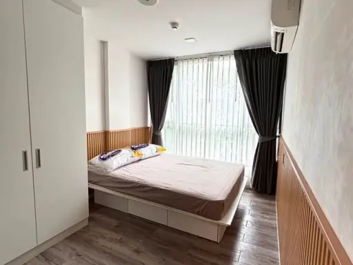 Selling Atmoz Chaengwattana condo, 3rd floor, fully furnished with all amenities. Book now!