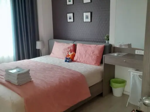 Selling a 2-bedroom Aspire Sathorn Thapra apartment. Features high-quality wallpaper and a bright, unobstructed view. Don't miss out! images