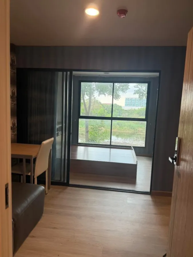 For rent: The Excel Khu Khot, Building C, 2nd floor. Includes washing machine, wallpaper throughout, and high-quality double-layered curtains. Book no